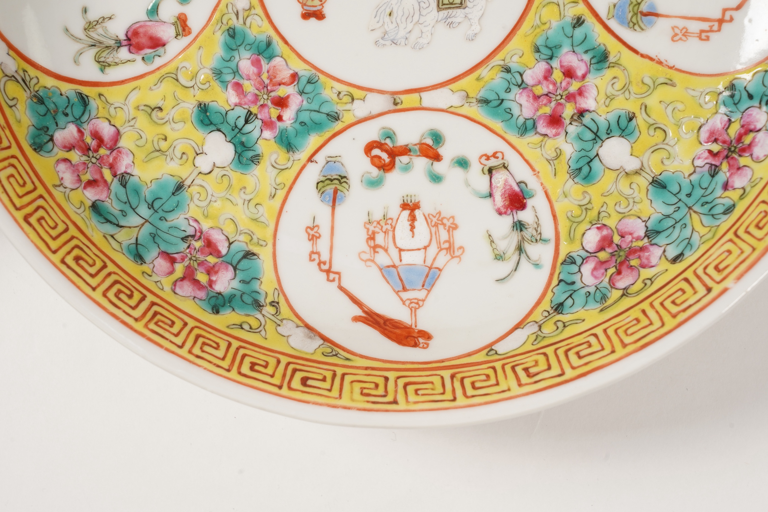 A pair of Chinese yellow ground medallion saucer dishes, Guangxu six character marks, early 20th century